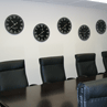 Black White Wall Clocks in Board Room